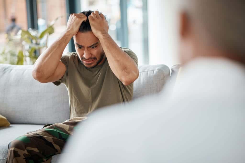 person in therapy showing trauma signs